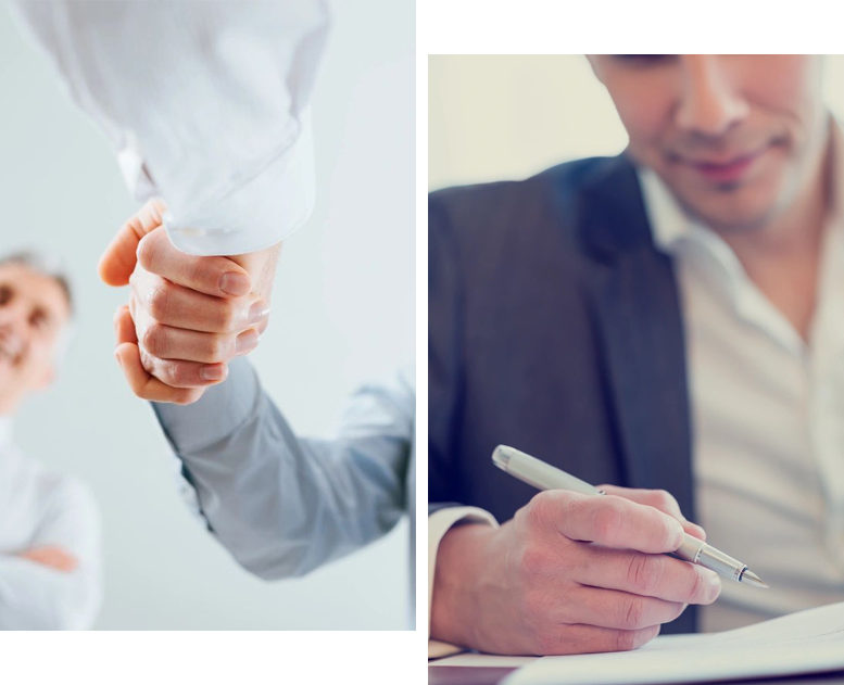 Two men shaking hands and one man writing on a paper